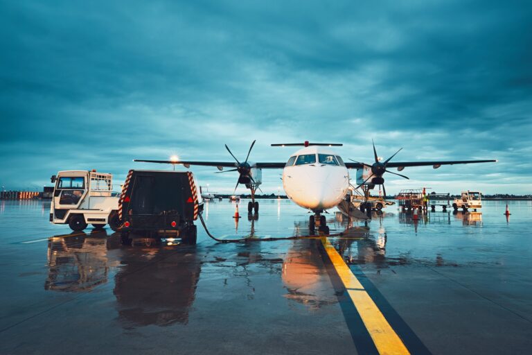 A busy airport in the rain